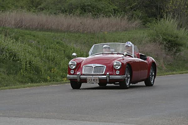 Denny & LeeAnn Elimon, Mahomet, Illinois. 1961 MGA 1622, "1 Lt-Red" Have owned the car since since 1992, She has traveled to numerous gatherings and shows, great family member. We have been British car enthusiasts for years! Have owned & enjoyed MGB's, MGTD's. MGBGT's & Midgets. Active members of the North American MGB & MGA Register organizations. Founding member of the Illinois Flat Land British Car Club, past Secretary of the North American MGB Register. 