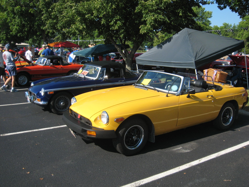 1976 MGB (Sunshine Yellow) we have owned the car since 1993. The paint job was done that year, and has held up very well. It has been a fun ride, now that we are down in central Florida, it is driven every day. Winter's down here are just a good excuse to go for a ride, and explore, there are car shows here literally every weekend, within 100 miles of us, all year round! 